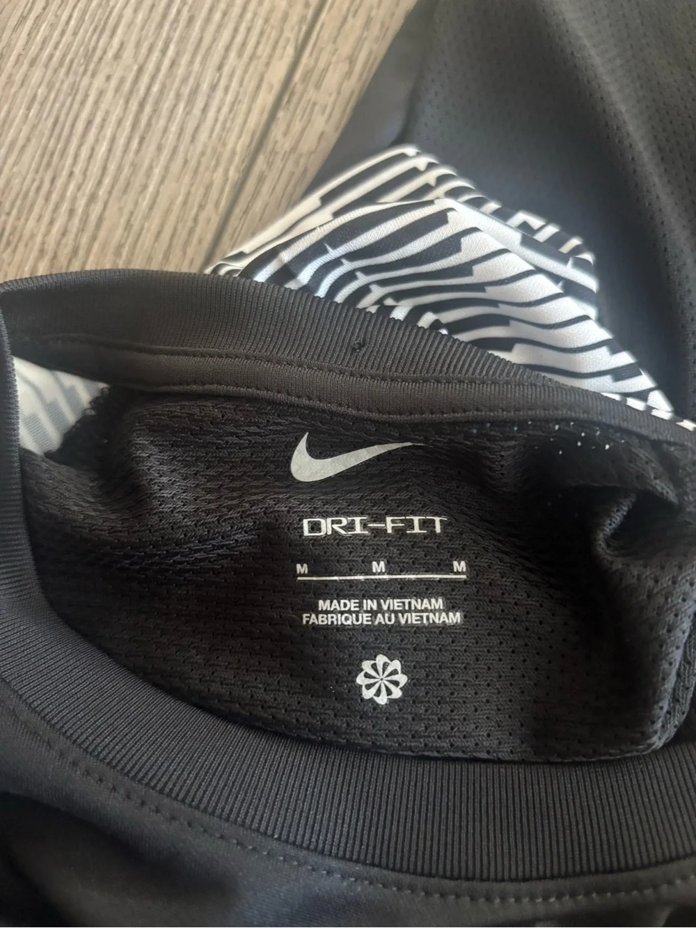 Nike Black Short-Sleeve Athletic Tee with Striped White Sleeves